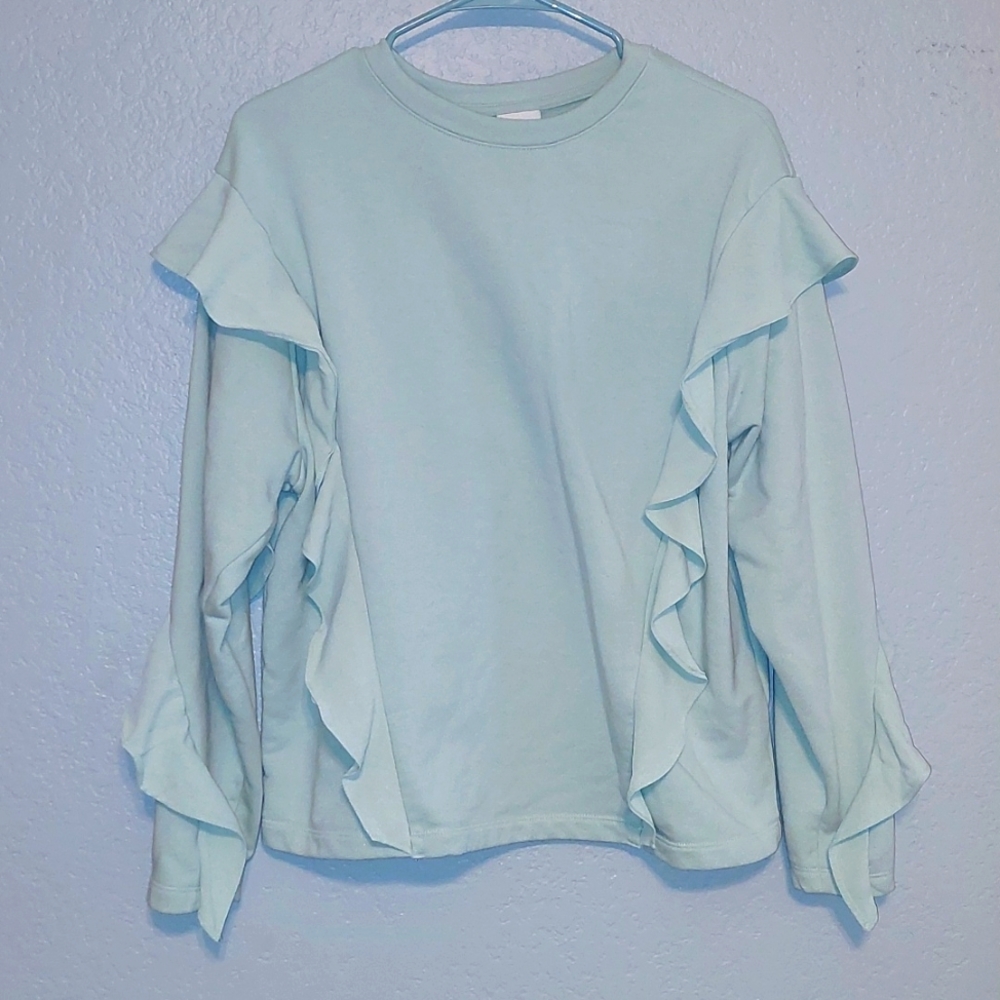 A. New. Day. Green shirt